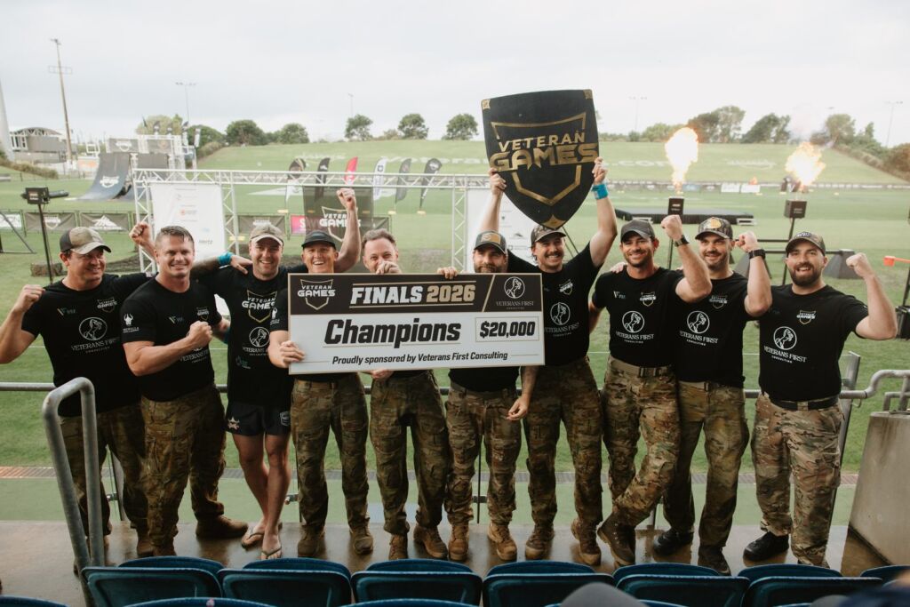 Veterans For Youth celebrating with the Finals 2026 Champions cheque at Sunshine Coast Stadium